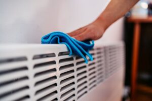 Cleaning and maintaining electric storage heater
